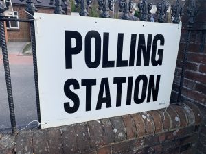 Sign outside a polling station, UK